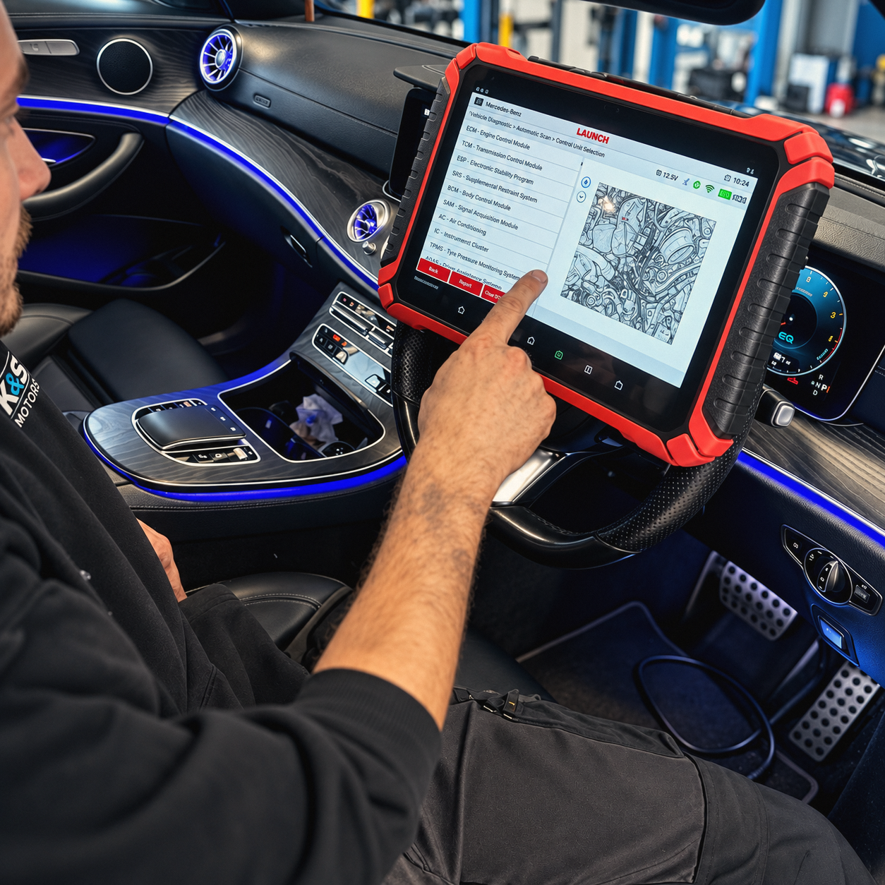 Technician using a diagnostic tool in a vehicle